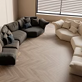 Modern Living Room With Dark And Light Curved Sofas On Herringbone Wooden Floor