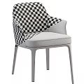 Various Colored Modern Chairs With Leather And Fabric Upholstery And Black Legs