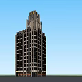 Tall Modern Skyscraper With Ornate Top Design Against Clear Blue Sky