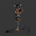 Game Movie Character Robot Rat Orange Black Holding Gun Standing on Gray Base with Rocks