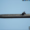 Modern Military Submarine With Dark Hull And Conning Tower Floating On Blue Sea Surface