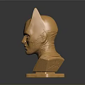Golden Female Bust Sculpture With Bat Like Ears Helmet On Dark Background