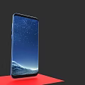 Modern Blue Smartphone Displaying Starry Sky Mountain Wallpaper On Red Platform