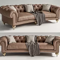 Brown Leather Multi-seater Sofa With Button Tufted Design Gold Legs And Throw Blanket 3d model