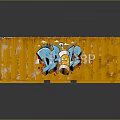 Orange Cargo Container With Blue Graffiti Art On Exterior Surface