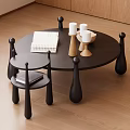 Modern Round Coffee Table With Small Side Table Notebook Candles And Bowl On Wooden Floor