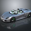 Silver Convertible Sports Car With Sleek Design Green Accent Wheels And Reflective Surface