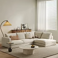 Modern Living Room Sofa and Coffee Table Set with Neutral Pillows and Floor Lamp