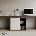 Modern Wooden Desk with White Drawers Black Desk Lamp Computer Monitor Green Plant and Books