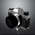 Vintage Electronic Camera With Silver And Black Design And Classic Lens