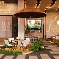 Outdoor Restaurant Design With Straw Umbrellas String Lights Stone Walls And Green Plants
