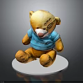 Yellow Stuffed Bear Wearing Blue Shirt With Footprints On Paws Sitting On White Base