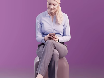Woman Sitting On Brown Stool Using Mobile Phone In Light Blue Shirt And Gray Pants 3d model