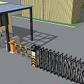 Entrance Gate With Security Booth Barrier Gate And Yellow Industrial Building Under Blue Sky