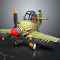 Green Airplane Model Featuring Shark Mouth Design Red Propeller Nose Black Blades And Orange Details