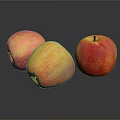 Three Fresh Apples With Red And Yellow Gradient On Black Reflective Surface