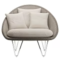 Modern Wicker Leisure Chair With Beige Cushions And Silver Metal Legs