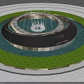 Circular Water Fountain With Multi Tiered Design Surrounded By Green Foliage In Outdoor Plaza