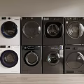 Four Modern Front Load Washing Machines with White and Black Stylish Designs
