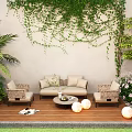 Outdoor Patio Plant Combination With Climbing Vines Palm Tree Flowering Shrubs And Wicker Sofa