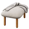 Light Gray Padded Sofa Stools With Wooden Legs And Checkered Fringe Blanket