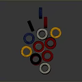 Colorful Circular Rings in Different Colors Stacked Together Against Black Landscape Background