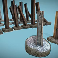 Rusty Metal Piles As Defensive Weapons With Concrete Bases Standing And Slanting