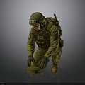 EOD Soldier In Military Uniform Kneeling To Defuse Explosive Device With Tactical Gear