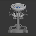 Futuristic Mechanical Device Structure With Blue Glowing Circular Top And Metallic Base