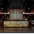 Cultural Center Interior Lobby with Reception Desk Stone Feature Wall Grid Ceiling and Wooden Decorations