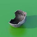 Broken Natural Eggshell Serving As Small Decorative Container On Green Background