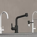 Three Modern White And Black Faucets Mounted On Countertop With Light Wall Background