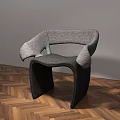 Modern Gray Fabric Leisure Chair With Unique Curved Frame On Wooden Floor