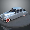 Classic Silver Vintage Car With Red Wheel Rims On Circular Platform