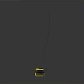 Yellow Portable Work Light With Adjustable Stand And Black Cable On Dark Surface