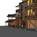 Traditional Wooden Homestay Building With Balconies Amid Green Mountains And Peach Blossoms