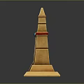 Golden Obelisk Structure With Green Gemstone Red Accents And Square Base