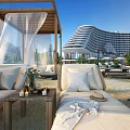 Outdoor Leisure Space With Wicker Loungers Light Cushions Small Table Vase Candles Modern Building