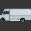 Silver Metallic Food Truck With Green Windows And Reflective Surface