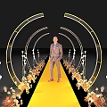 Elegant Event Entrance with Yellow Carpet Arched Decorations Lighting and Flowers