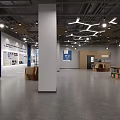 Modern Technology Company Lobby With Geometric Lighting Large Windows Wooden Bookshelves And Gray Reception Desk