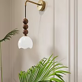 Modern Wall Lamp Design With Wooden Beads White Glass Shade Beige Interior Green Plants