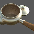 Vintage Silver Teapot With Wooden Handle And Shiny Metallic Body