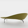 Modern Curved Light Green Sofa With Sleek Lines and Floor Lamp in Minimalist Interior