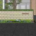 Elegant Modern Landscape Wall With Brick Pattern Greenery And Lawn In Front Of Building Entrance