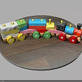 Colorful Wooden Toy Train on Round Wooden Table with Multicolored Wheels