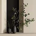 Minimalist Gray Vases with Green Leaf Branches in Modern Neutral Wall Interior