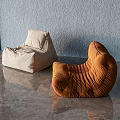 Light Colored and Orange Bean Bag Chairs in Modern Room with Smooth Floor
