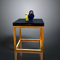 Modern Dining Table with Black Tabletop and Golden Frame Featuring Yellow and Blue Owl Figurines