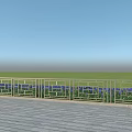 Ornate Metal Railings Along Wooden Floor With Blue Flowers And Green Grassland Under Blue Sky